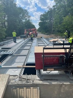 Workers rebuilding the bridge. 