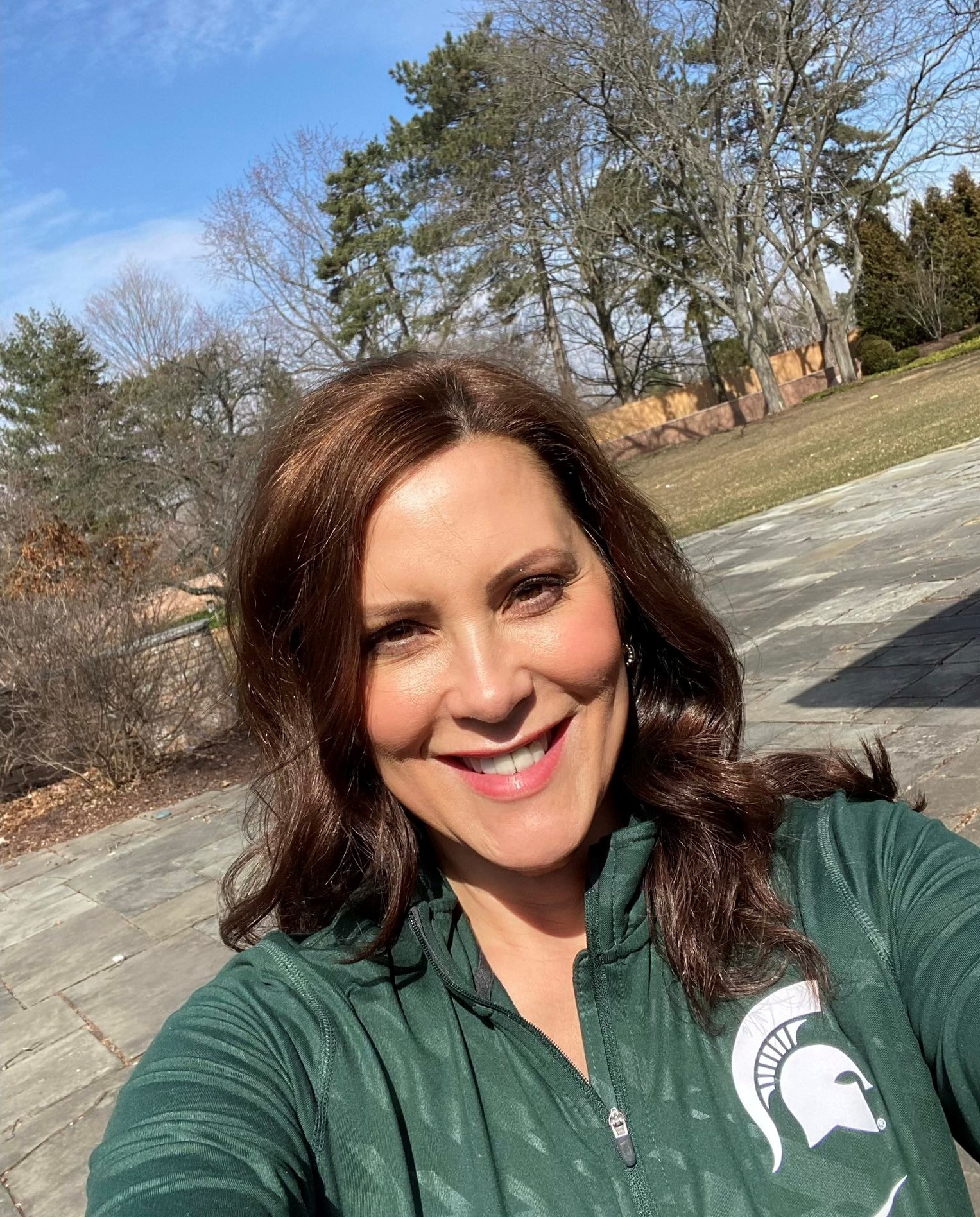 Gretchen Whitmer wearing Spartans gear