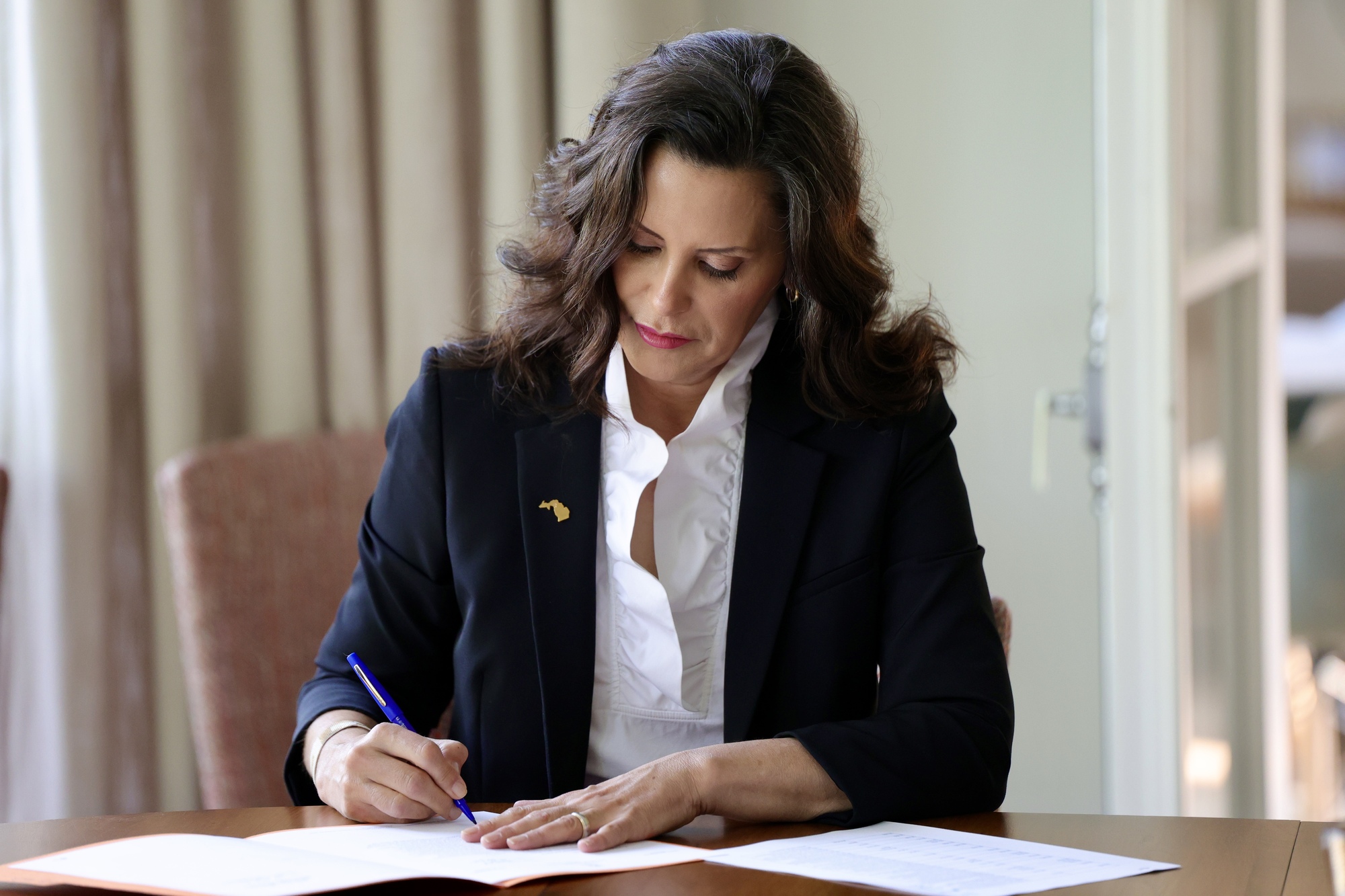 Governor Whitmer signing a bill