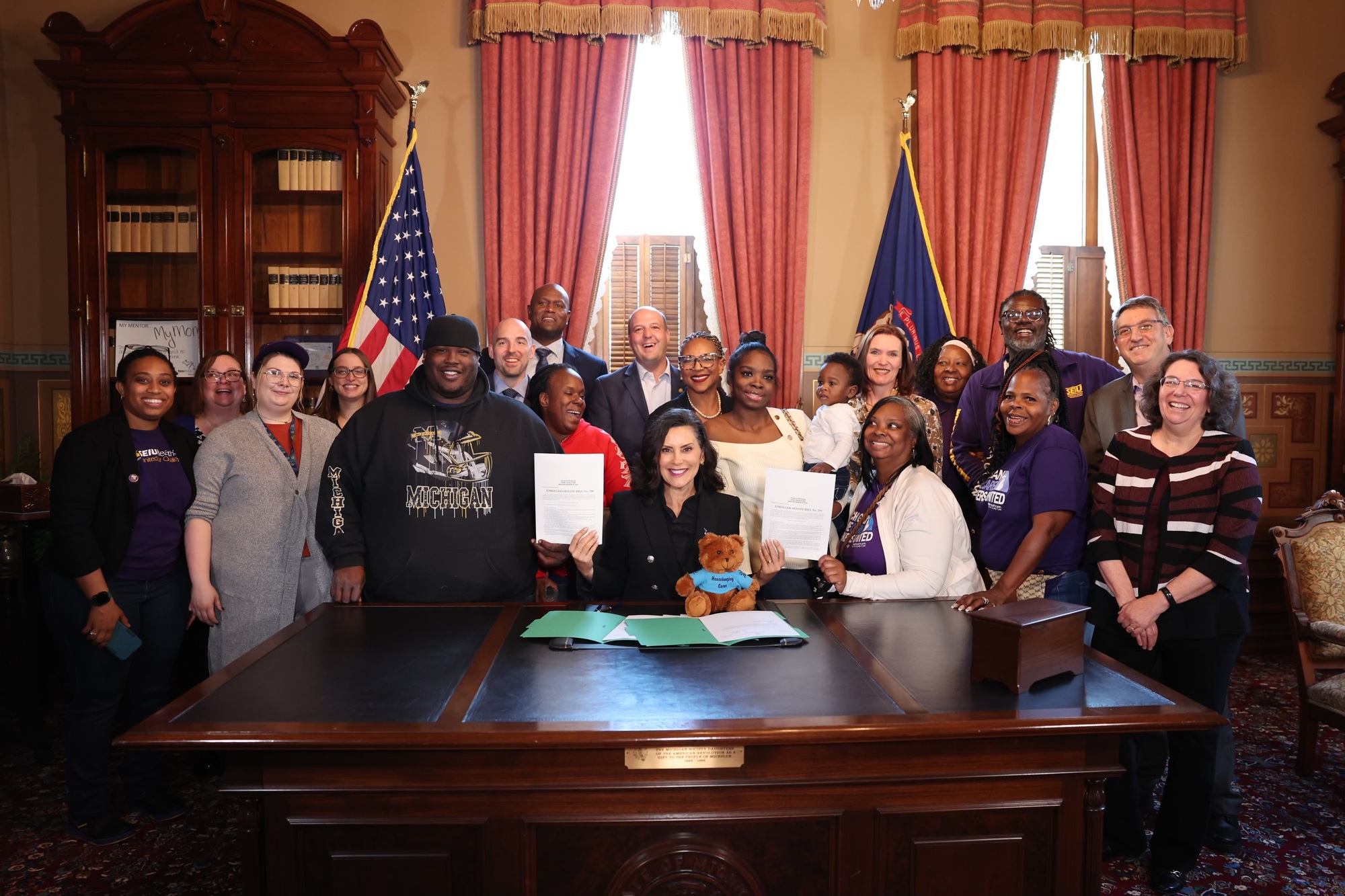 Gov. Whitmer signing a bill