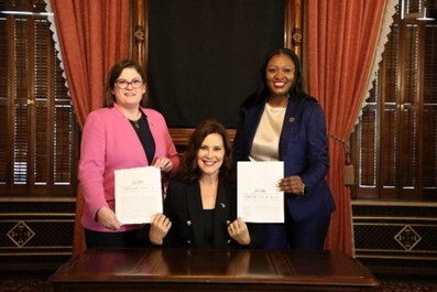 Rep. Hope standing with Sen. Anthony and Gov. Whitmer at a recent bill signing.