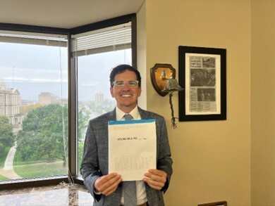 Rep. Morgan pictured in his office with House Bill 5108
