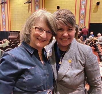 A photo of Rep. Betsy Coffia and Benzie County Commissioner Karen Cunningham