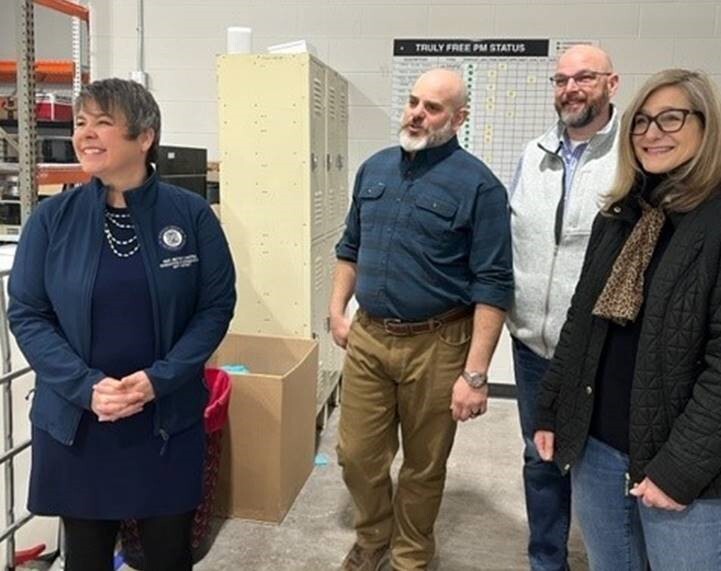 A photo of Rep. Coffia touring the Truly Free facility.