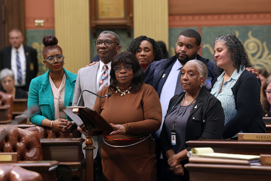 Rep. Brenda Carter (D-Pontiac) stands at a podium speaking about the 70th Anniversary of Brown v Board of Education May 15, 2024
