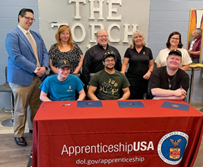 Torch 180, MCTI staff and Apprenticeship staff signing Registered Apprenticeship forms