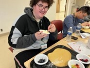 Close up of a student having lunch during the Introduction to Culinary Arts program