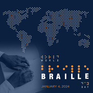 World Braille Day text and braille dots next to a hand reading braille text