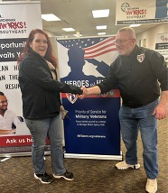 Brenda shaking hands with Veterans' Career Advisor