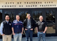 VES staff in front of Traverse City parking building