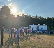 Workers lining up in front of an Intercare healthcare truck