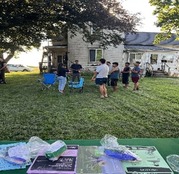 Photo of AFLS staff conducting farmworker outreach