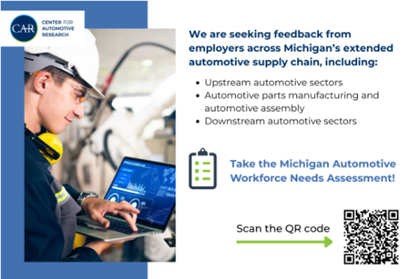 Graphic of man working on laptop in an auto plant