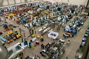 Overhead view of warehouse filled with attendees and booths during previous Great Lakes Expo event