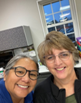 Picture of AEL Martha Cerda and Nyblad Orchards representative.