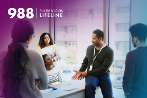 988 graphic of group of people sitting around desk