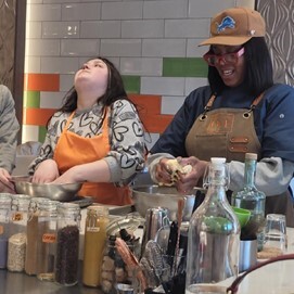 Two Pre-ETS students prepping in a kitchen