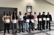 Detroit Home Builders MARC graduates holding their certificates