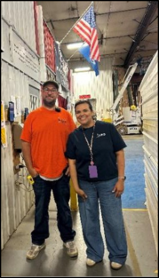 Staff member with McElroy Steel worker
