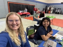 Abigail Frost and Elizbia Xaxni-Capula at outreach event