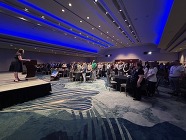 Room full of people attending the NASWA Veterans Conference