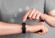 Close up of woman checking fitness watch