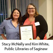 Stacy McNally and Kim White, Public Libraries of Saginaw, accepting award