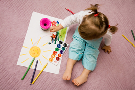young child painting