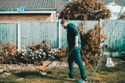 man using gardening tools
