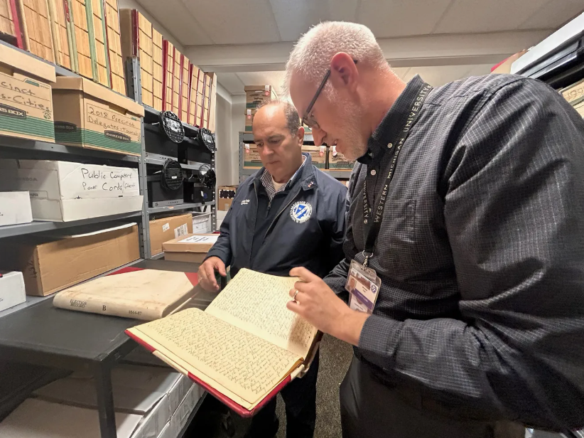 Clerk Forlini and Michael Grix