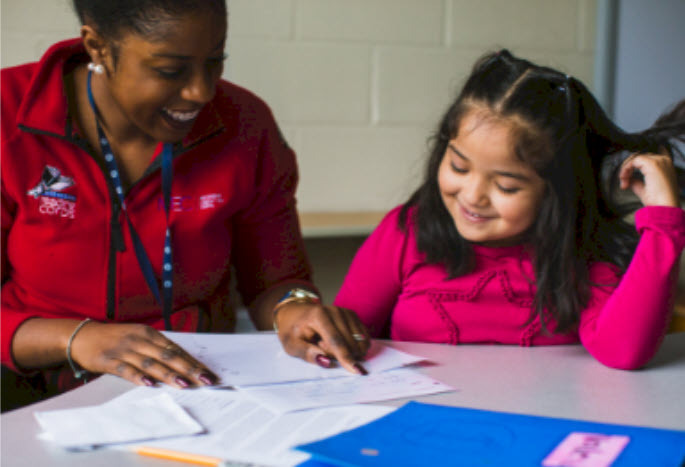 Teacher with student