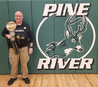 Police Officer with trophy