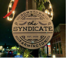 Image of Farmington's "The Syndicate" sign