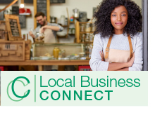 Local Business Connect: Coffee Shop Owner Standing by her Storefront.