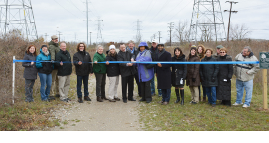 Ribbon cutting marking the North Spur Trail Acquisition in 2017. 