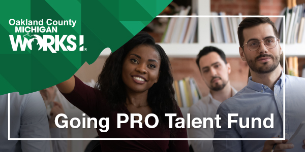 Going PRO Talent Fund | Woman raising her hand in a session
