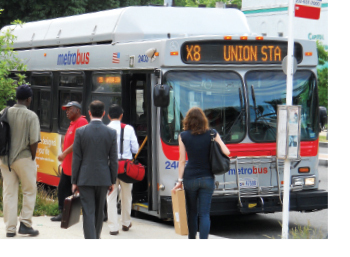 People boarding a public transit bus