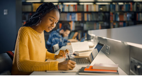 College student studying in the library