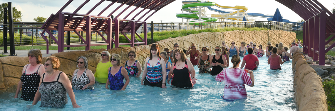 people walking in the river ride for river walk
