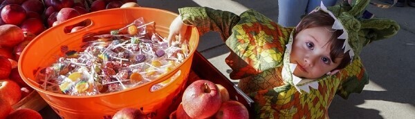 child in costume trick or treating