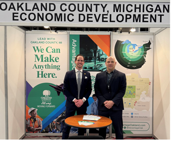 Oakland County Business Reps Christopher Michael and John Wolf-Meyer at Aeromart Montreal