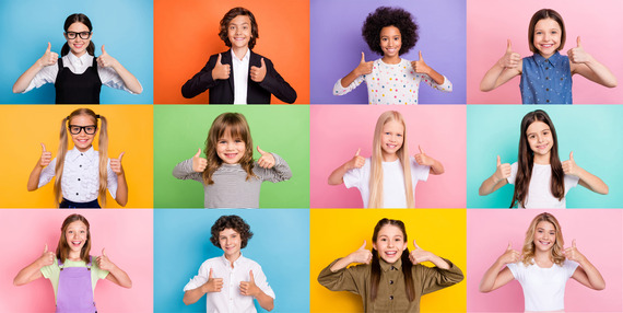 Kids giving a thumbs up