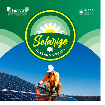 Solarize Oakland County | Person working on solar panels