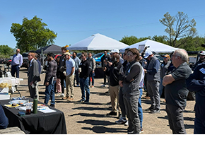 A group of attendees at the Holly Oaks ORV Park Industry Day listening to a presentation.