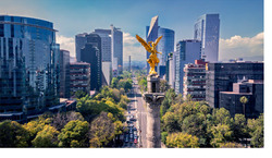 Photo of a Golden Angel Statue atop a monument in Mexico City