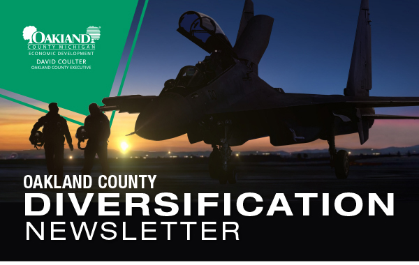 Oakland County Economic Development Diversification Newsletter. Two pilots walking away from a military jet at sunset.
