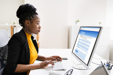 Woman at computer taking a survey