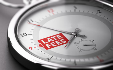 Clock highlighting late fees