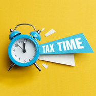 clock with tax time banner