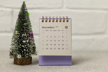 holiday tree with December 2023 calendar page